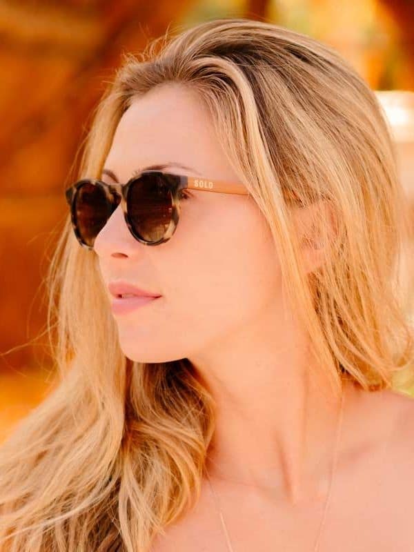 solo eyewear model showing off sustainable sunglasses